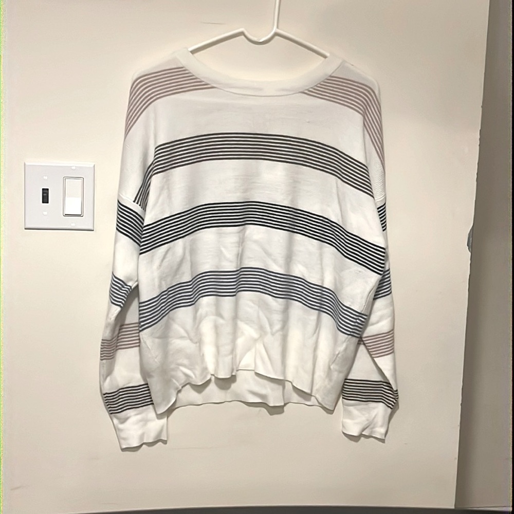 White blue pink striped sweater